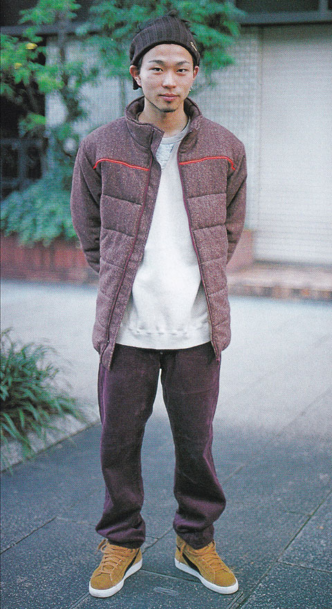 Photo of a man wearing baggy 2000s style streetwear fashion in Japan